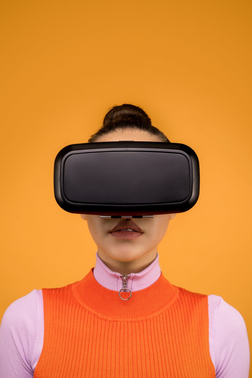 woman in a long sleeve shirt wearing black vr goggles