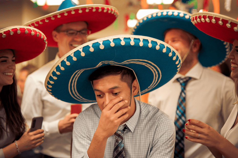 A group of people wearing sombreros, symbolizing diversity and celebration, ironically reflecting the lack of authentic inclusion when DEI efforts are discarded.