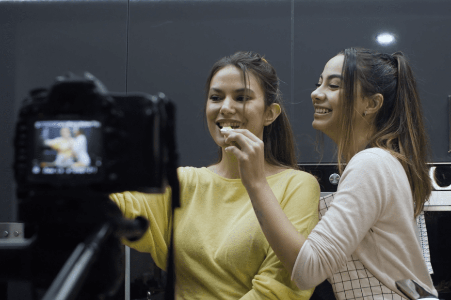 Picture of influencers smiling.
